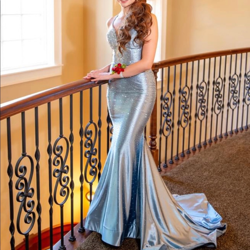 Sherri Hill size 0 sliverish/blueish color looks brand new only worn once